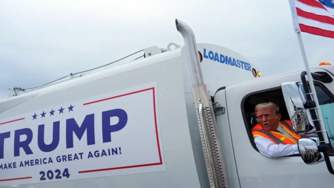 Trump wears garbage collector uniform – Firstpost