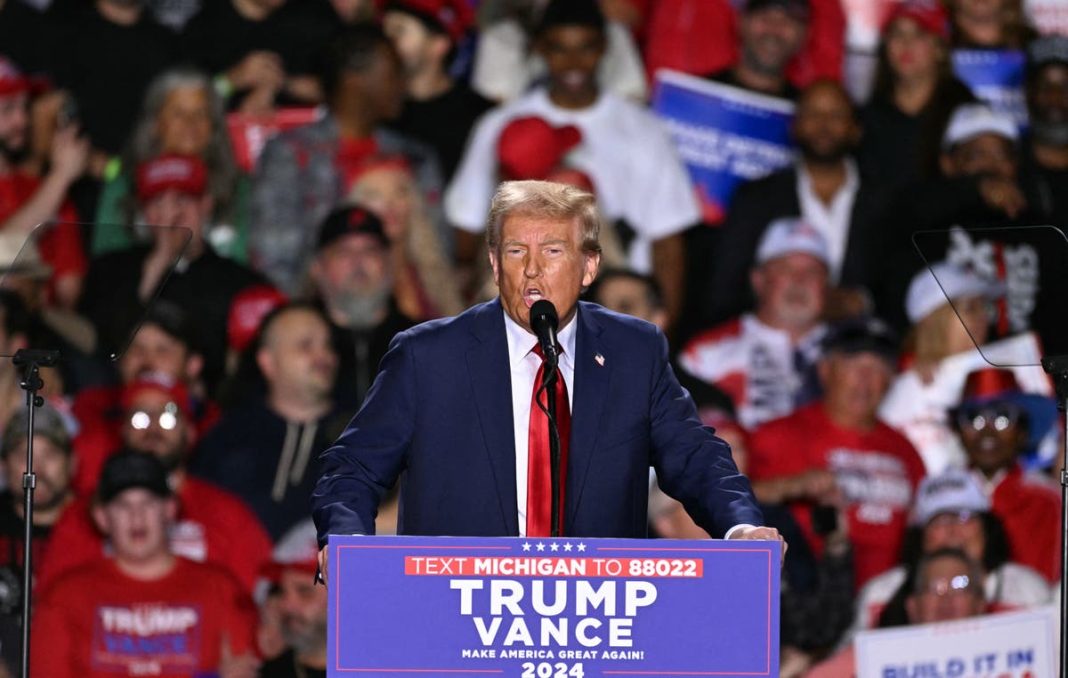 Trump paces for 18 minutes after mic goes out before launching into usual rants during Detroit rally: Live