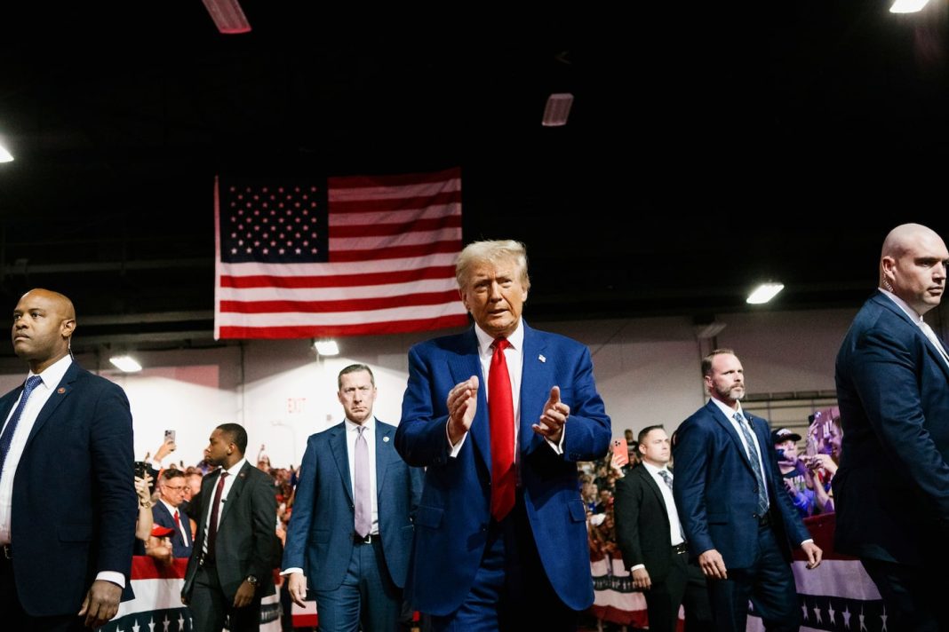 Former president Donald Trump, the Republican presidential nominee, arrives at a town hall at The Greater Philadelphia Expo Center & Fairgrounds in Oaks, Pa., on Monday, Oct. 14, 2024.